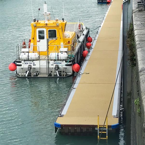 Bespoke fishing boat pontoons allow crew access when harbour dries out